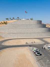 Pyramid precast structure with UAE flag at Yassat Island