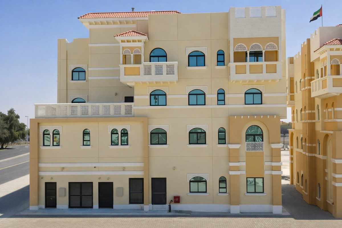 Multi-story staff accommodation building with Emirati architectural details